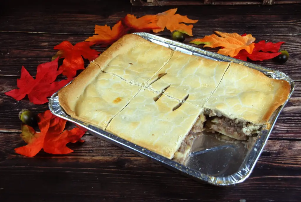 greenhalghs large deep filled multi portion poato and pie cut into six slices