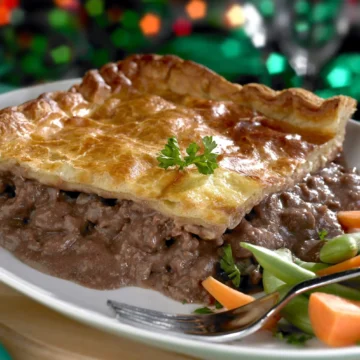 greenhalghs famous meat party pie served with veg