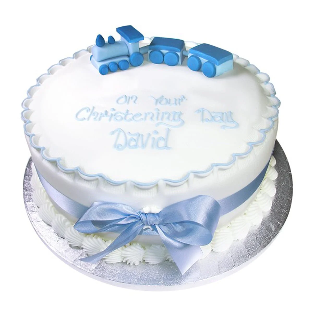 blue and white christening cake with blue train topper