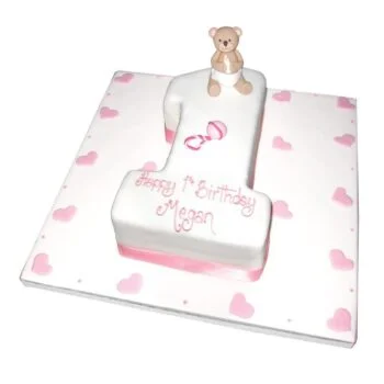 white and pink babys 1st birthday celebration cake with sugar paste teddy