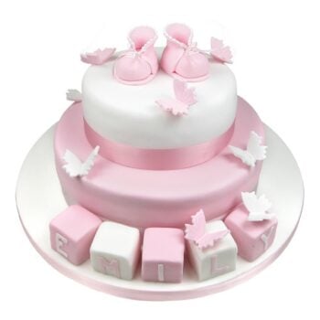 pink and white butterflies, boots and blocks cake