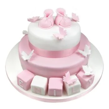 pink and white butterflies, boots and blocks cake