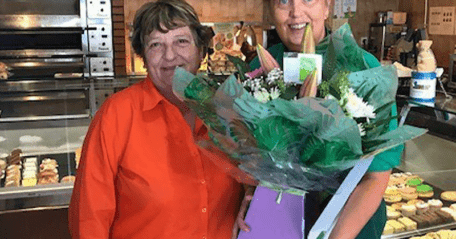 Susan Andrews receiving flowers