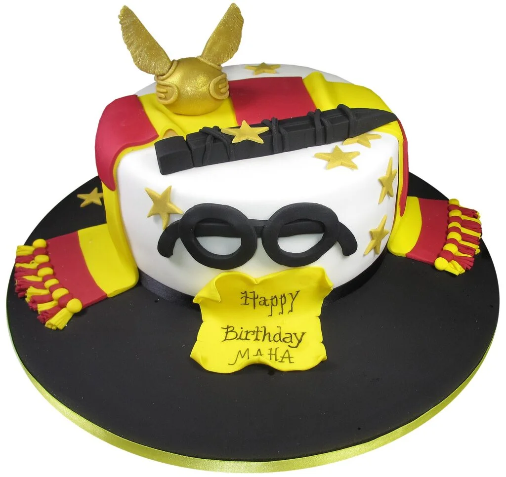 Magic school celebration cake in the house colours from the harry potter films