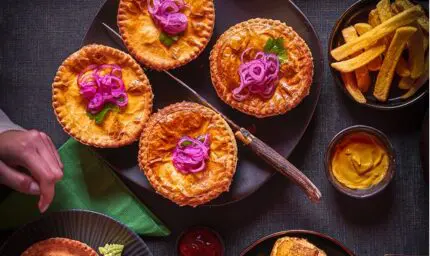 celebration party with sausage rolls, pies and pasties