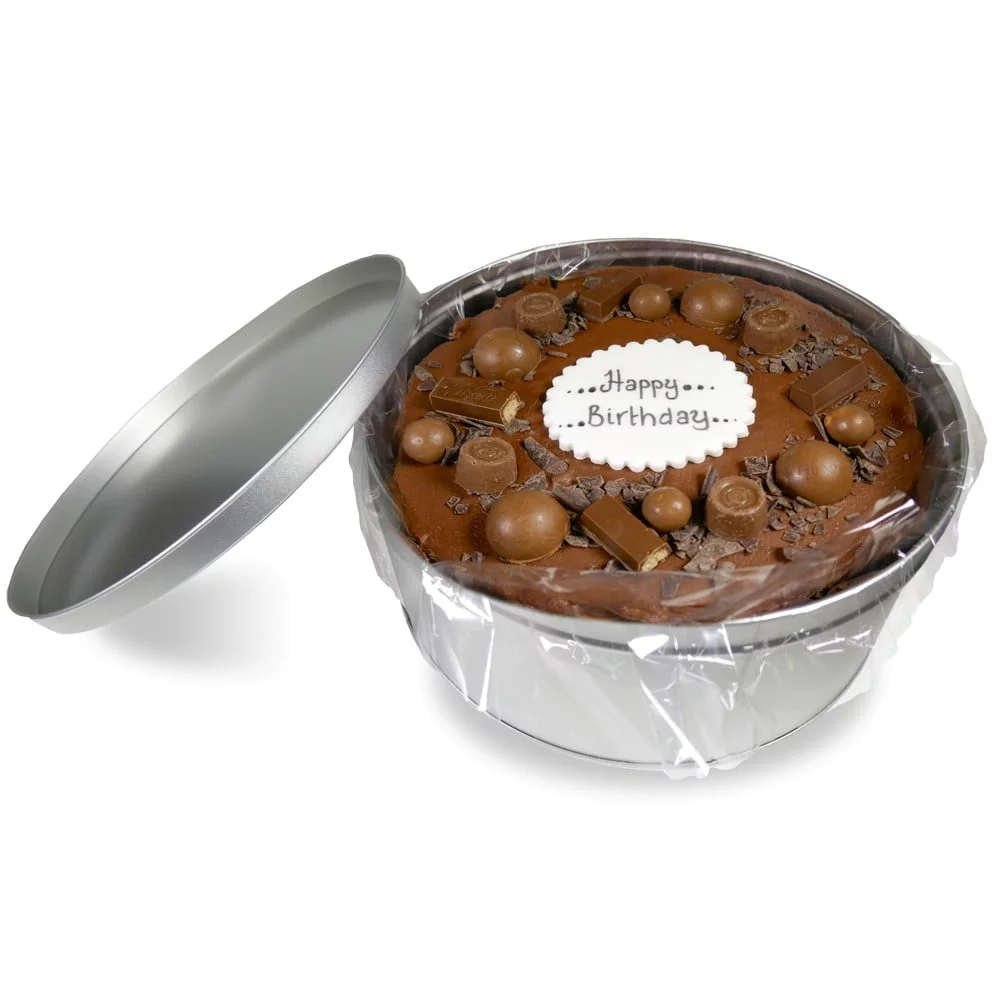 greenhalghs chocolate cake in a silver tin topped with chocolate chunks