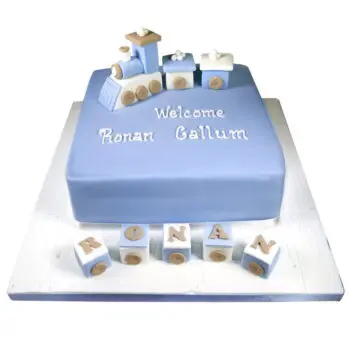 blue and white baby train cake
