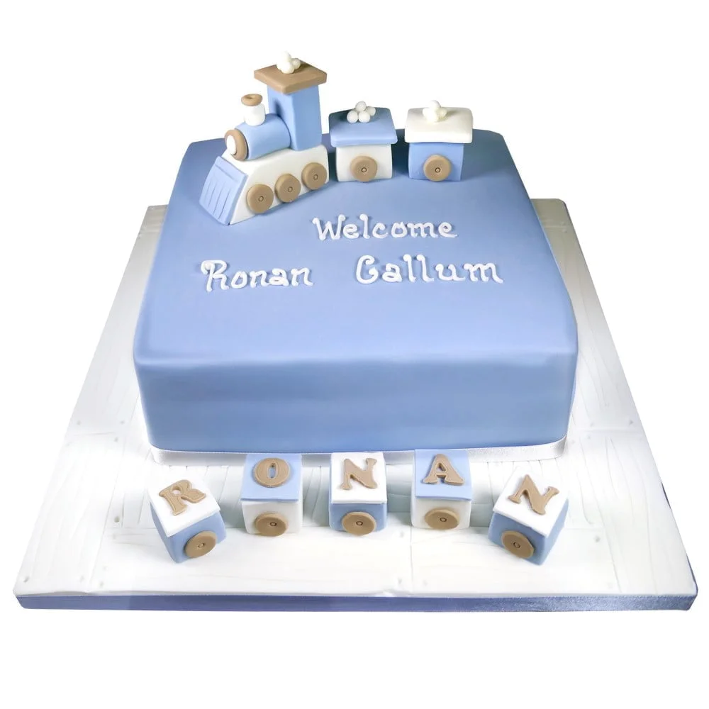 blue and white baby train cake