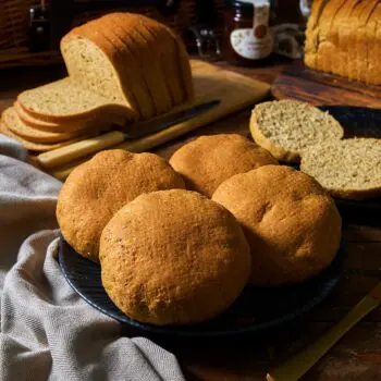 Freshly baked low-carb bread loaf with a golden crust, showcasing its delicious texture and color.