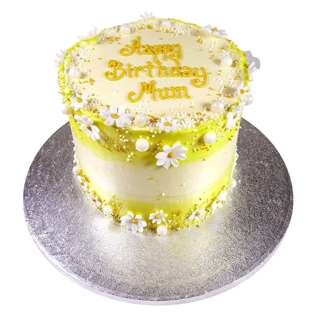 sunshine daisy celebration cake decorated with sugar paste flowers and pearls with the inscription happy birthday