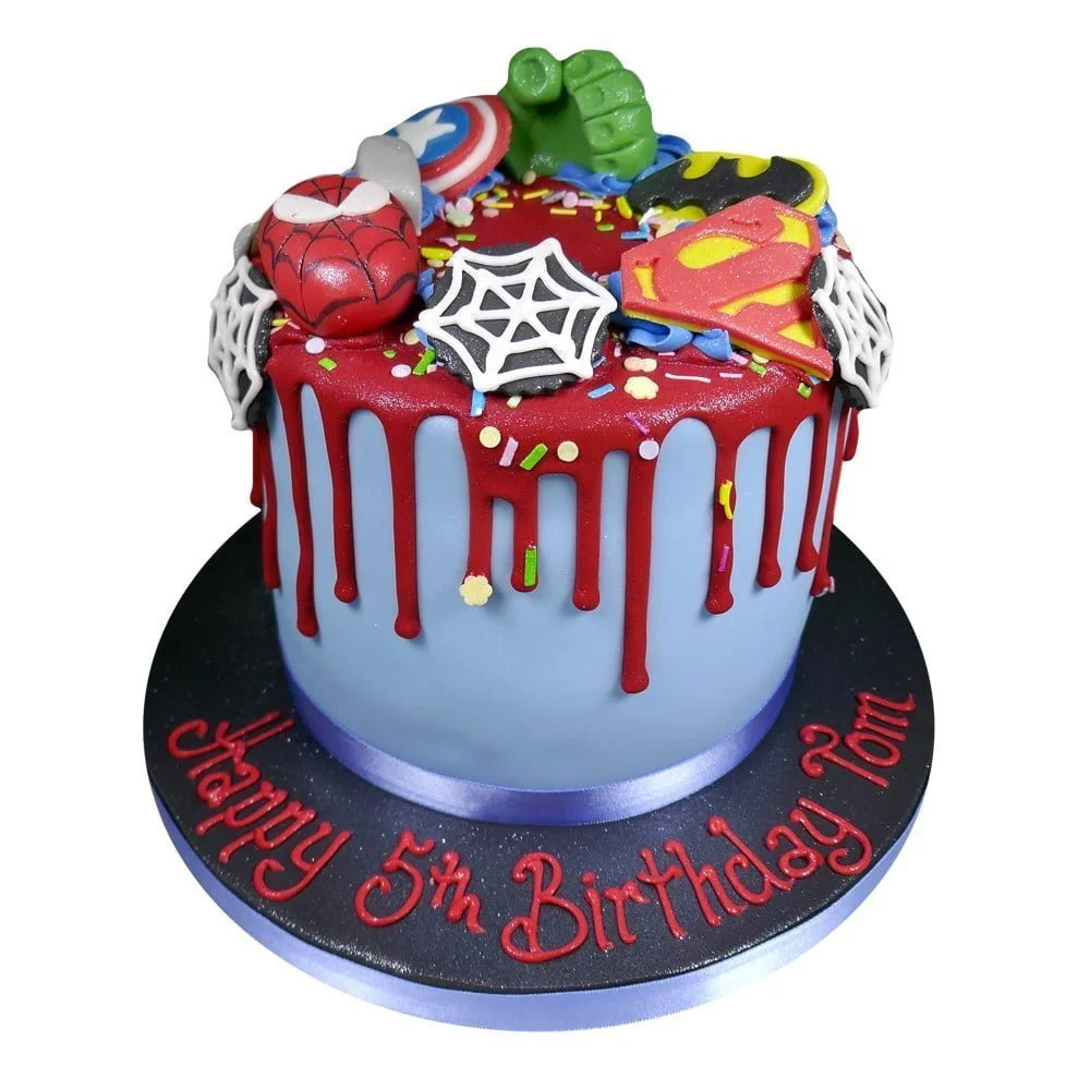 superhero supreme celebration cake with different dc and marvel characters on top of the cake