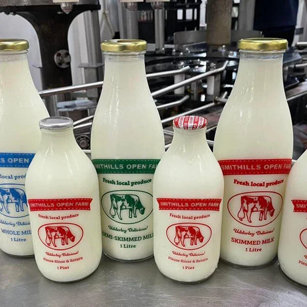 different sizes of bottled milk from Smithills Open Farm