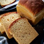 Greenhalghs Full size crumpet loaf bread with three slices for crumpet bread