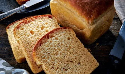 Greenhalghs Full size crumpet loaf bread with three slices for crumpet bread