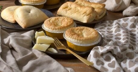 Build your own pie box featuring a selection of freshly baked pies and pasties in assorted flavors, perfect for customized orders.