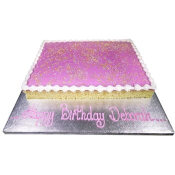 giant pink school cake with a pink inscription