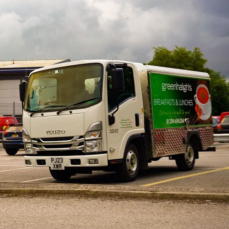 Greenhalgh’s sandwich van fully stocked with fresh sandwiches and snacks, catering a wedding event.
